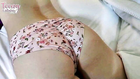 Scarlet Skies teasing in pink floral panties, exposing perky ass from behind