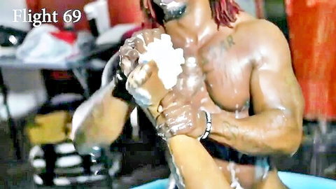 Muscular black stud with red dreads soaping young wife's arm in wet orgy