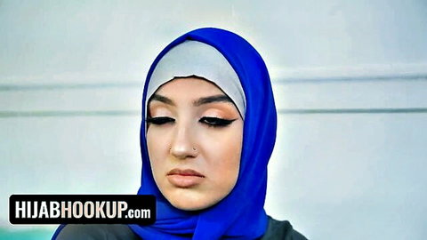 Violet Gems in blue hijab, seductive close-up for Hijab Hookup Mardi Gras scene