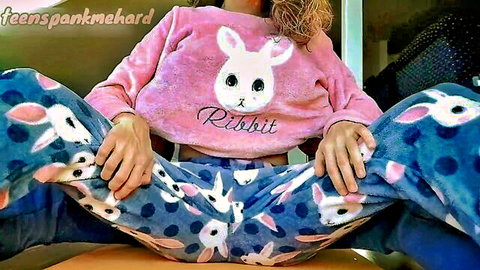 Stepsister in bunny pajamas spreads legs showing wet shaved pussy