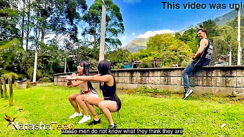 Isabella Uzcategui and Daniela Garcia squatting in outdoor workout teaser, fit Latina bodies