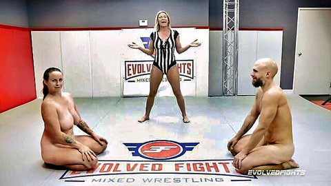 Bella Rossi and Dan Ferrari nude kneeling in Evolved Fights mixed wrestling match