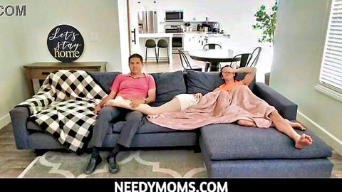 Dharma Jones cuddles with stepdad David Lee on couch during scary movie