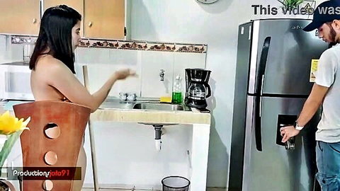 Slim Asian woman topless teasing cousin in amateur kitchen scene Part 1
