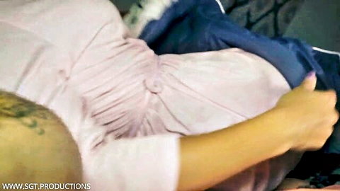 Misty Meaner in pink dress touching stepson on bed, hot MILF stepmom scene