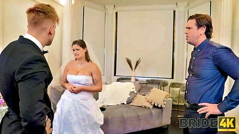 Taylee Wood as bride in white dress with two men in tense wedding scene