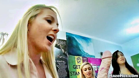 Blonde college girl eagerly sucking large pink dildo during sorority initiation
