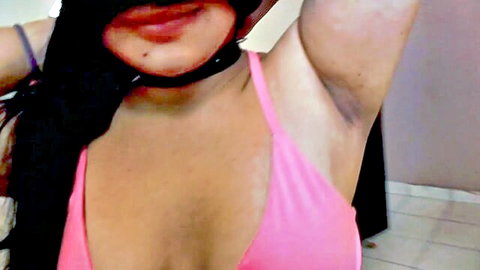 Stirling Cooper solo video thumbnail: woman in pink bikini top with choker