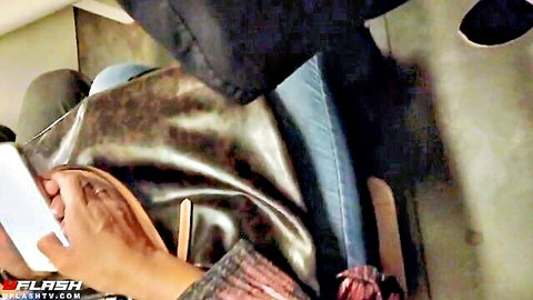 Amateur woman groping inside bag, close-up hand action in casual clothes