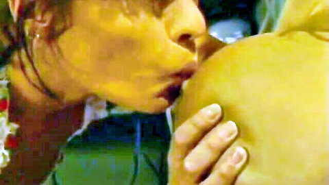 Tiffany Towers kissing huge tits in steamy threesome scene