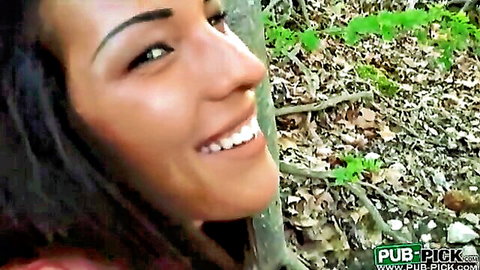 Maria Fiori smiling in woods during public pickup for cash sex video