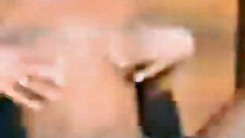 Excited blonde woman eagerly licking cock in close-up adult video