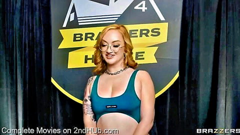 Redhead Lou Lou teases in teal crop top at Brazzers House 4 event