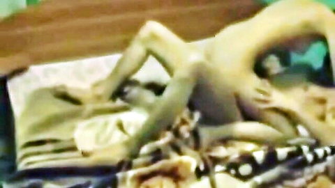 Amateur closeup of naked woman spreading legs wide exposing wet pussy on bed