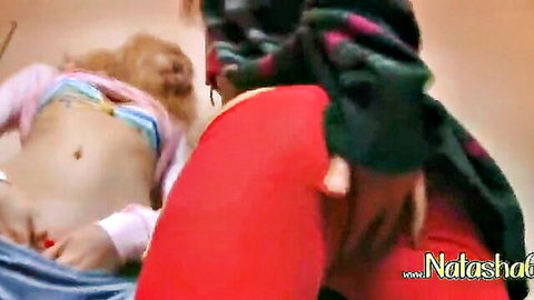 Blonde teen lies back spreading shaved pink pussy fingering with red nails boyfriend gropes in red shorts