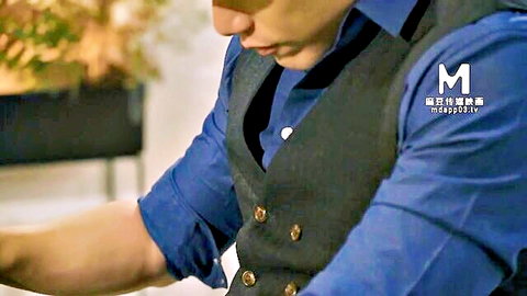 Handsome Asian man in blue shirt and gray vest, seductive close-up