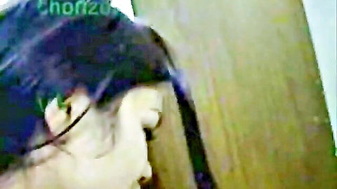 Mexican Latina woman showing her face in seductive profile, long black hair