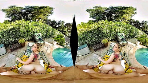 Blonde tattooed woman in yellow sarong bottomless by pool VR view