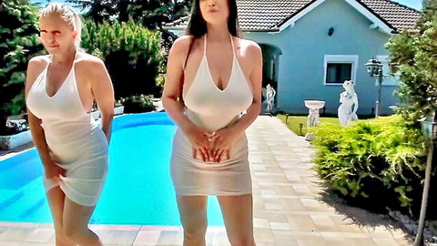 Two busty blondes in skimpy white dresses tease poolside flashing huge tits and asses