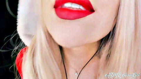 Blonde ASMR babe flashes perfect teeth and plump red lips in sexy Santa closeup