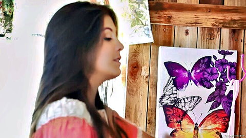 Natalie Monroe Latina teen in pink dress admiring butterfly art