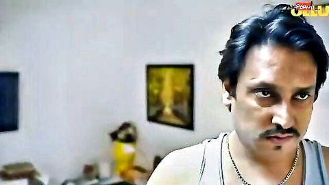 Intense Indian man in tank top, Garam Masala Ullu series thumbnail