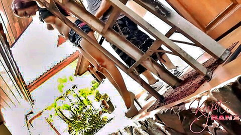 Petite teen seduces roofer on ladder in high heels, outdoor tease