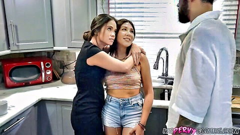 Brunette stepmom hugs busty stepdaughter in kitchen while black stud watches taboo scene