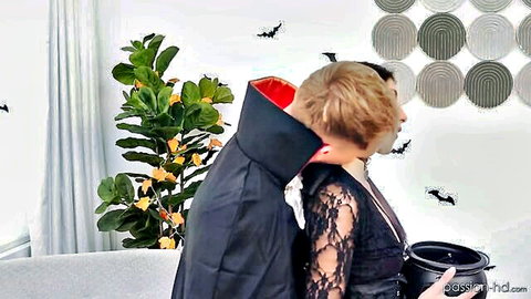 Penelope Woods in sexy vampire Halloween costume hugged from behind