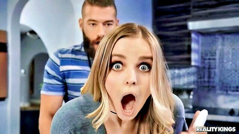 Codi Vore wide-eyed surprise with boyfriend behind in Reality Kings big tits scene