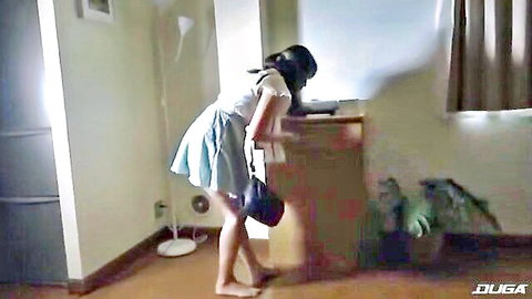 Asian schoolgirl in uniform bends over desk exposing bare shaved pussy and ass from behind