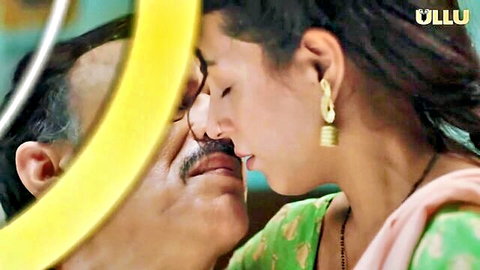 Desi milf daughter-in-law kissing older man in green saree