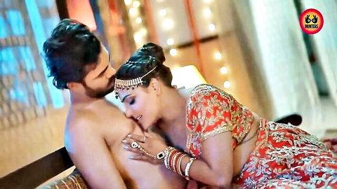 Indian MILF bride in red saree sucks muscular man's nipple passionately