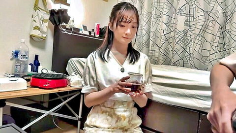 Petite Japanese amateur in white blouse and skirt holding drink