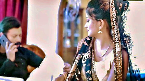 Desi Bihari bhabhi Sudipa in gold saree with husband on phone call