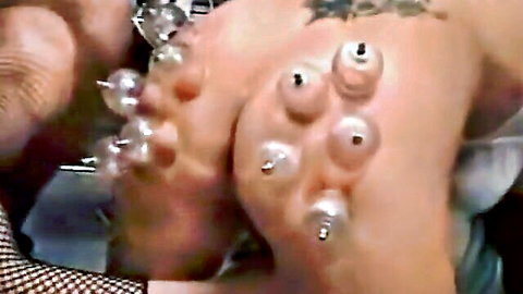 Extreme BDSM cupping torture on large breasts and arms, suction fetish play