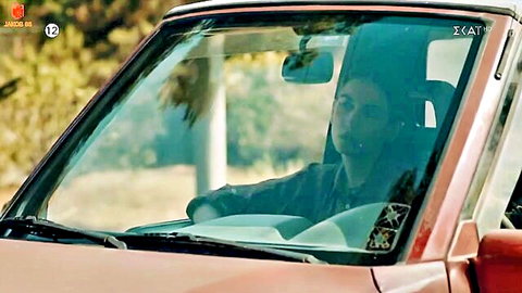 Greek actress Elena Bikou bound and cleave gagged in BDSM car scene
