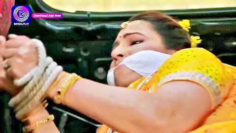Indian MILF bound and gagged in yellow saree BDSM scene