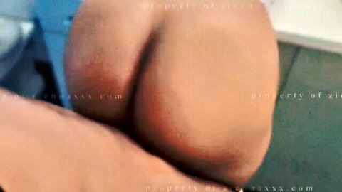 Ebony MILF bending over, showcasing her big juicy ass