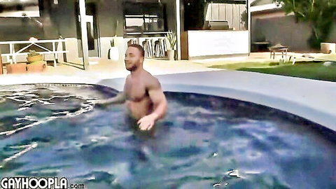 Hairy muscular guy relaxing in pool for gay porn video