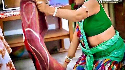 Sexy Indian maid in green saree teasing with red cloth