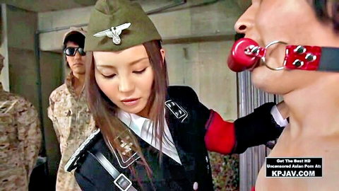 Japanese woman in Nazi uniform with ball gag BDSM JAV scene
