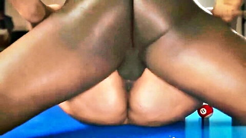Ebony babe spreads her dark wet pussy and massive black ass cheeks wide open on pool table