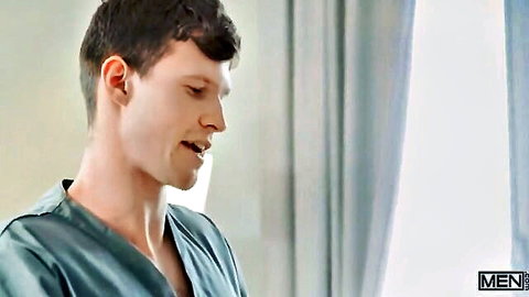 Ryan Jacobs in open shirt smiling from gay threesome with Finn Harding