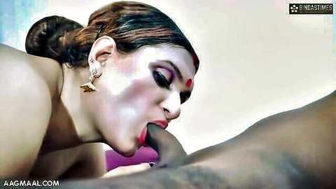 Indian MILF brunette sucks thick dark cock head with red lips and heavy makeup