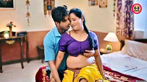 Indian man passionately kisses busty MILF's neck from behind caressing her exposed belly in low saree
