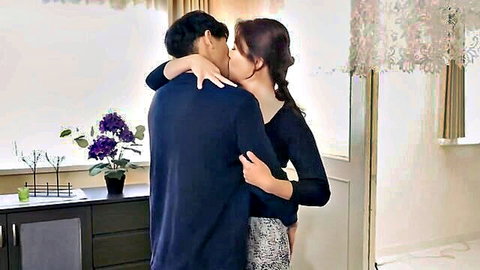 Yuriko Takazono embraces and kisses man from behind in passionate JAV scene