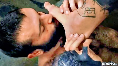 Markus Kage in tattooed gay foot worship with bearded partner
