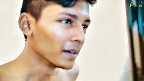 Shirtless South Asian hunk with undercut hair glancing sideways bare chest exposed