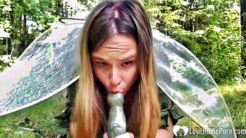 Blonde fairy cosplay slut deepthroats huge gray dildo outdoors in forest